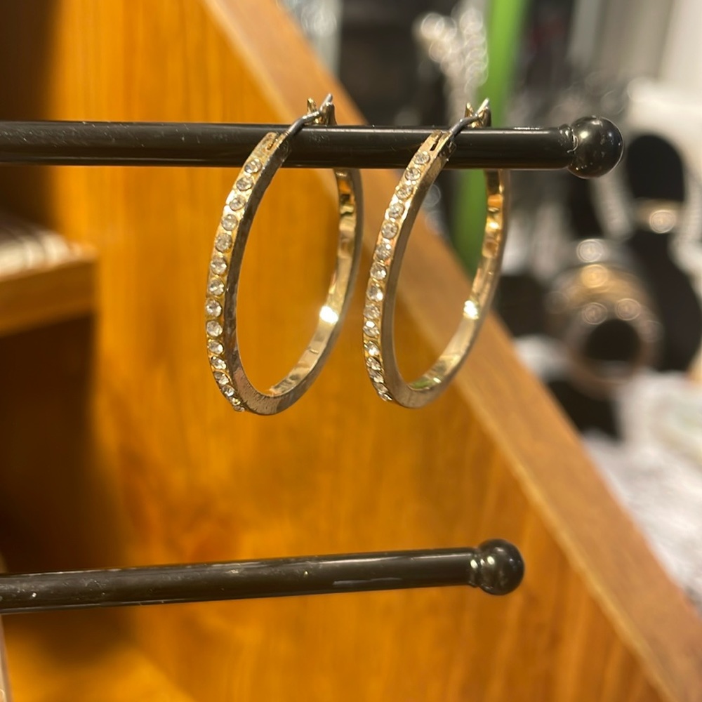Gold tone hoop earrings with crystals. No makers mark, mild tarnish and wear